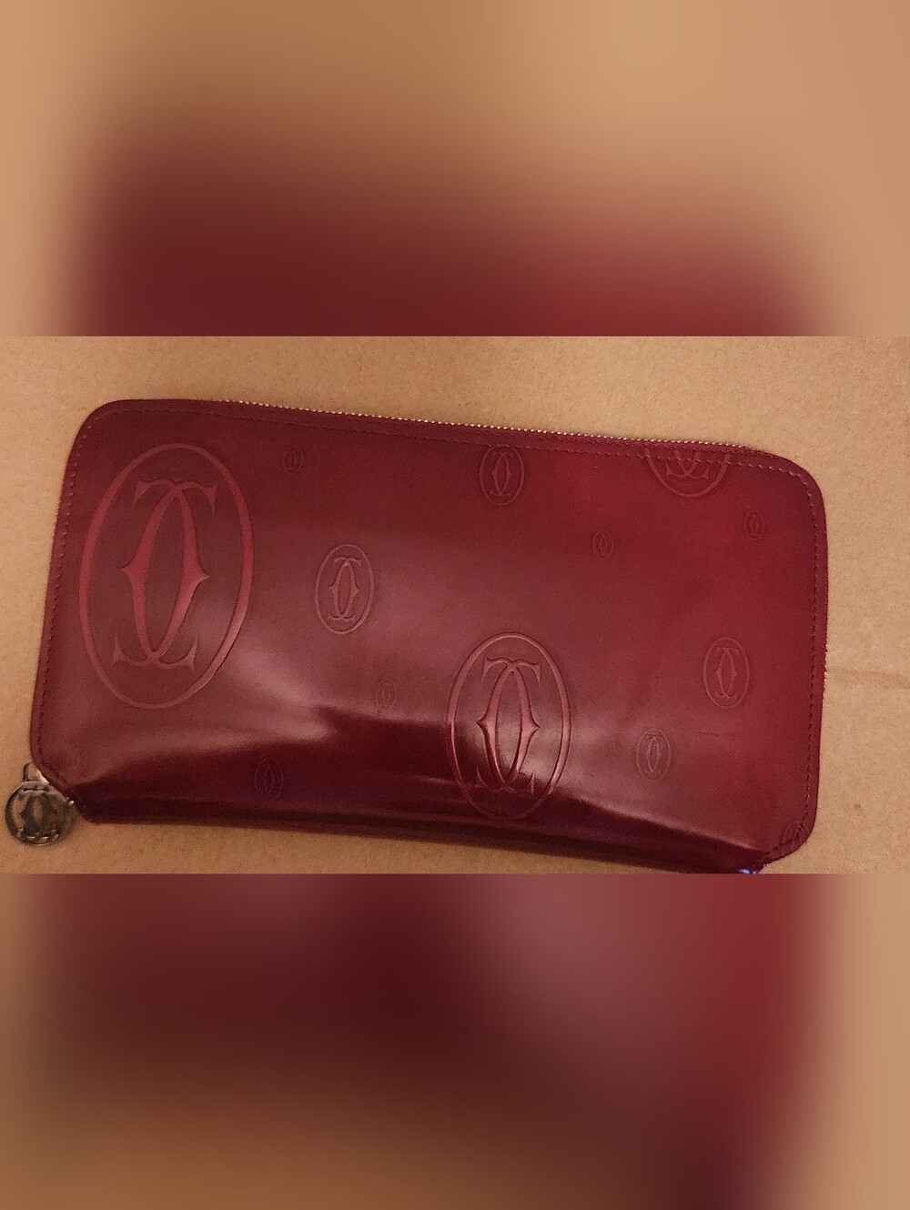 Cartier Deep Burgundy Embossed Leather Zip Wallet
